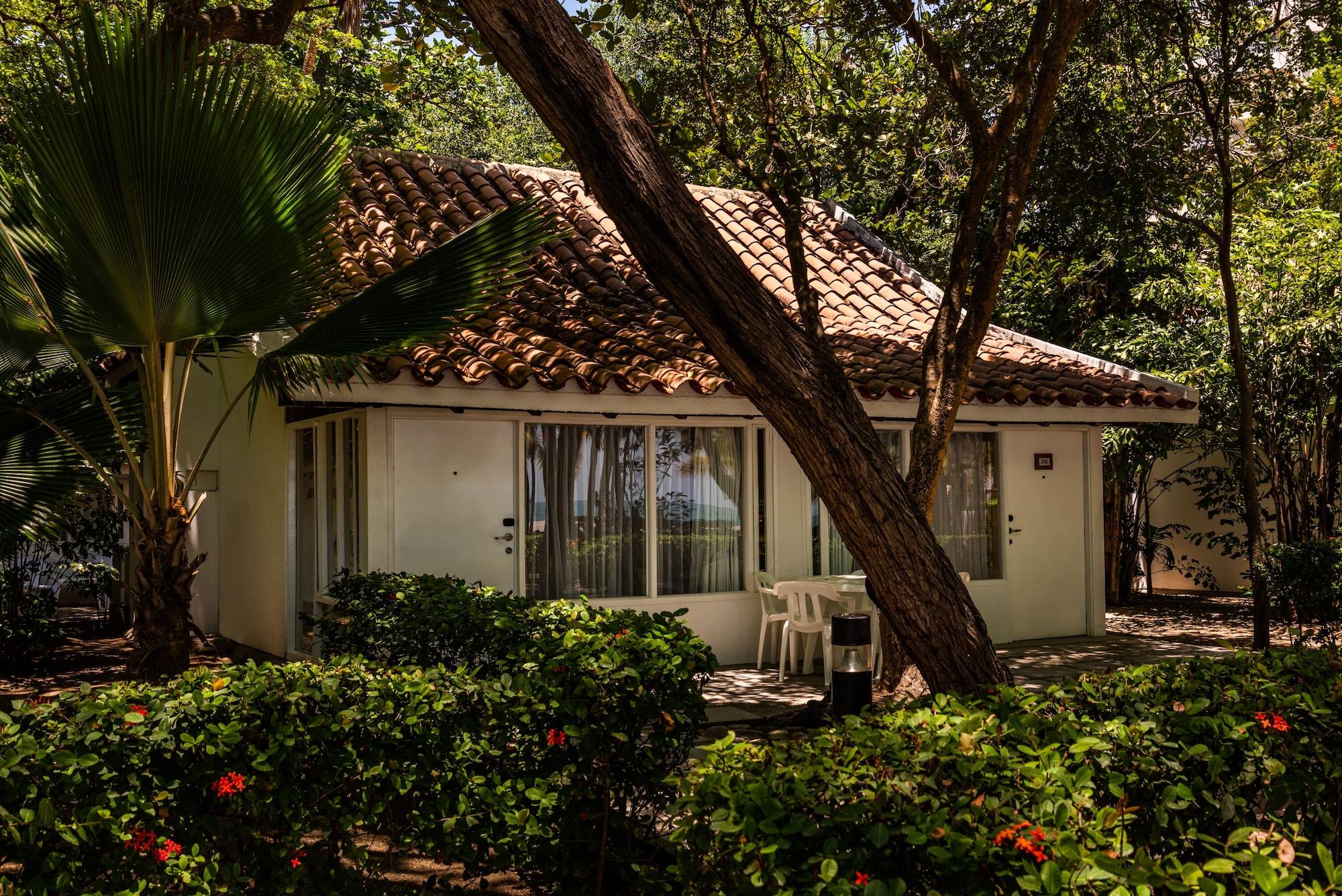 Hotel Irotama Lago Santa Marta  Exterior photo A bungalow at the resort